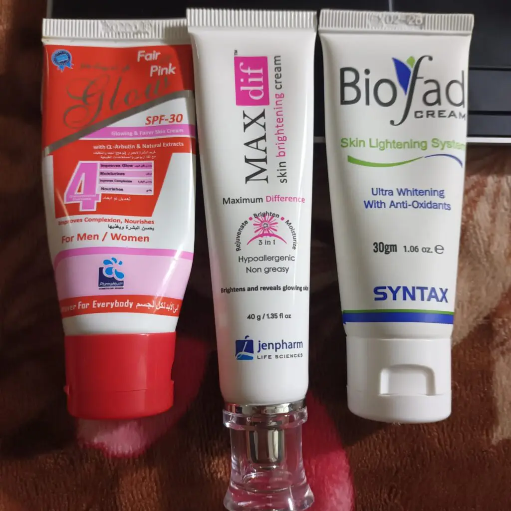 showing whitening creams laying on bed