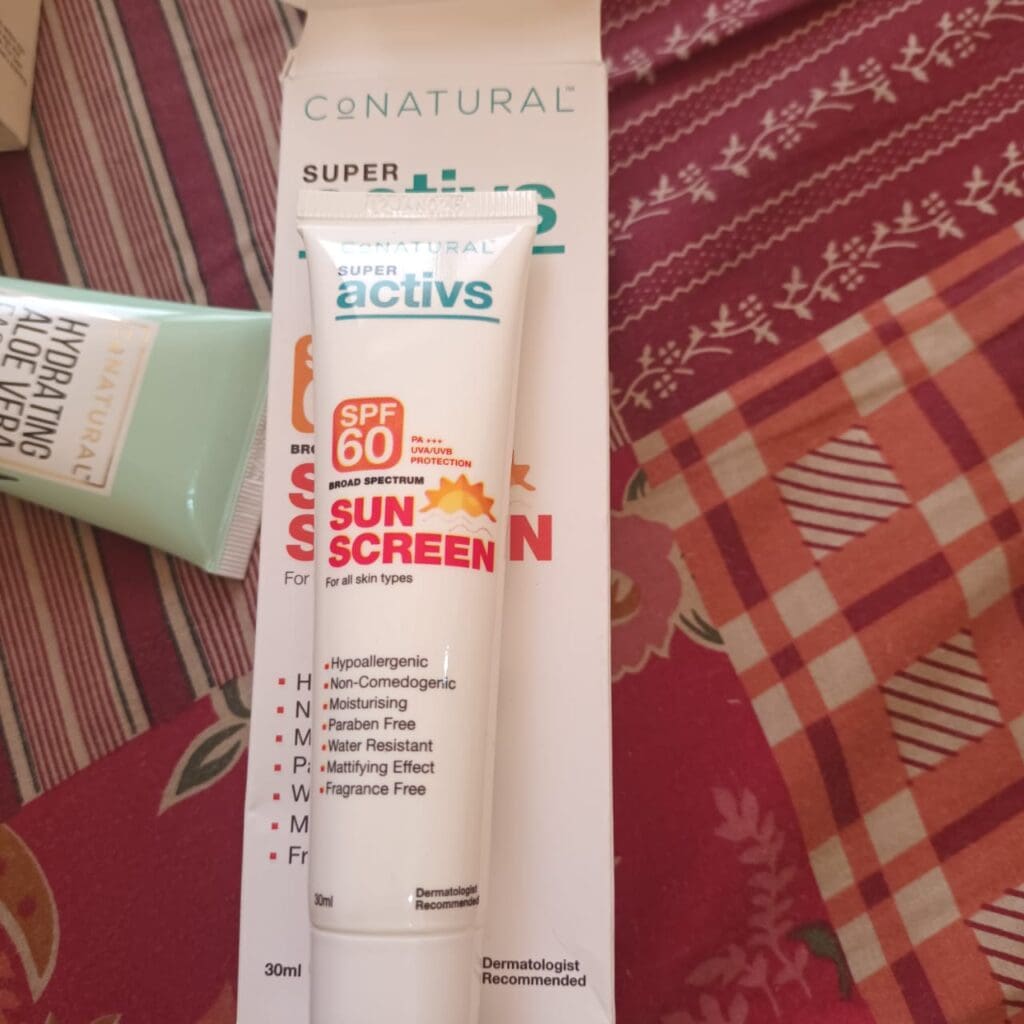 showing conatural sunscreen tube and packaging