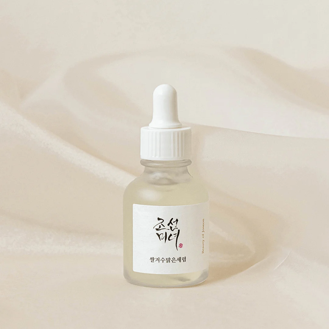 Beauty of Joseon Alpha Arbutin serum bottle placed on a soft beige background
